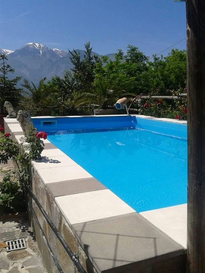 Detached 4 bed Farm house with 5000sqm of  land, swimming pool and 200 meters from the town center. 