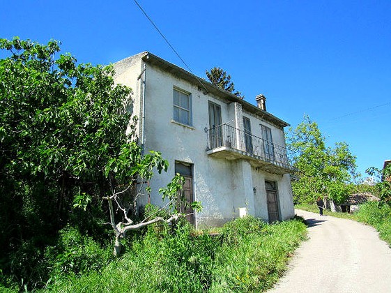 Detached, habitable, 4 bedroom house with a separate old, stone house, barn, garage and garden. 