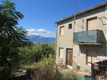 2 bed, 5000sqm of land, 200 meters to lively town and fabulous mountain views 1